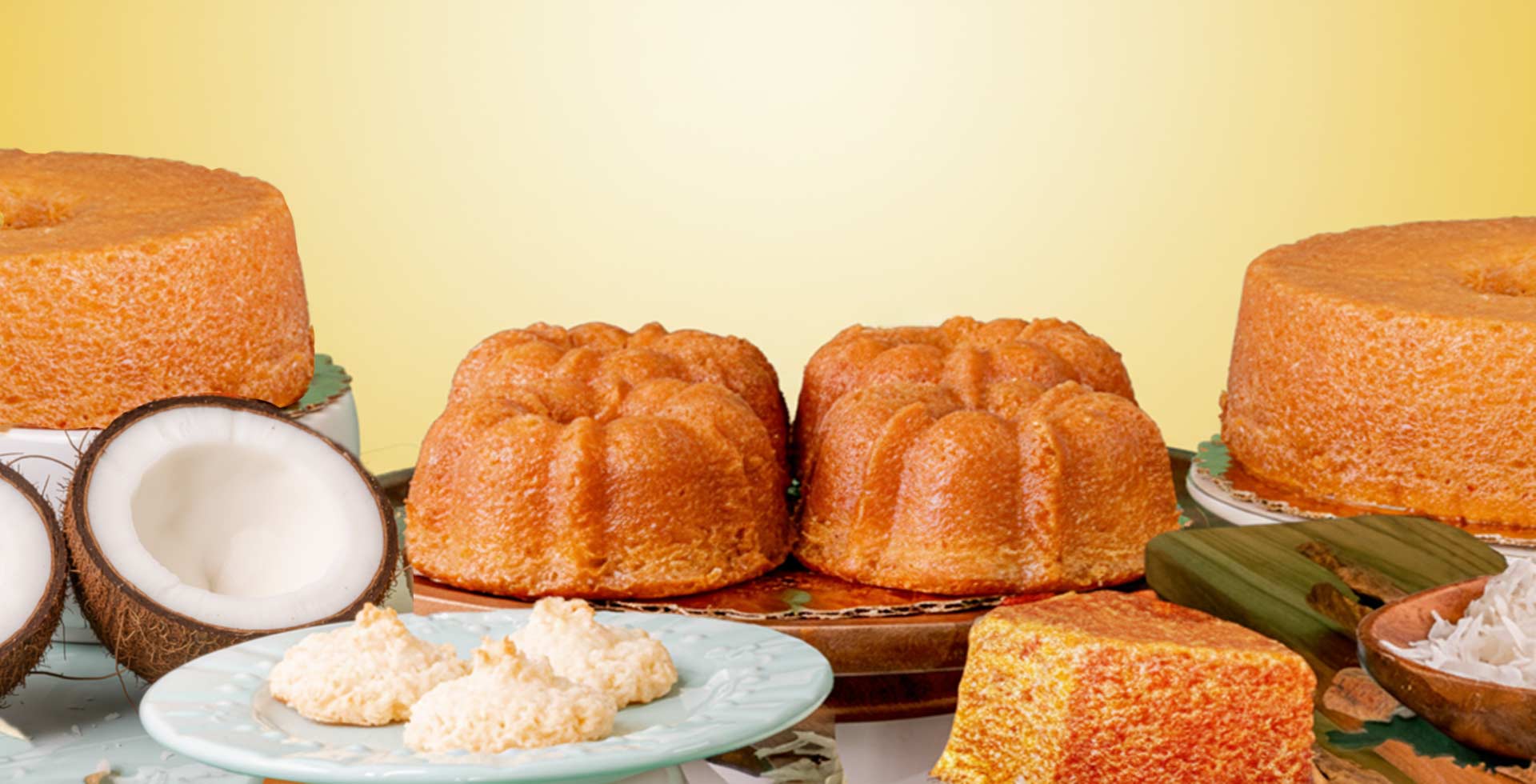 Assorted Bundt cakes on a yellow background